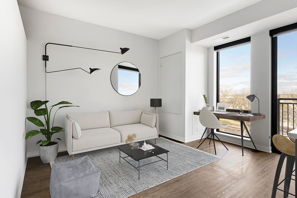 Alcove style living room with desk and seating